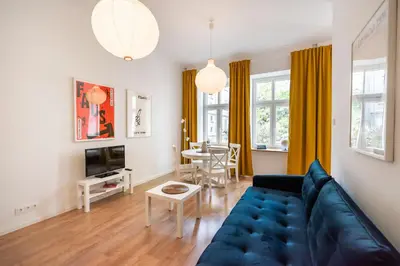Telewizja i/lub zestaw kina domowego w obiekcie New Praga Enchanting Studio by BookingHost