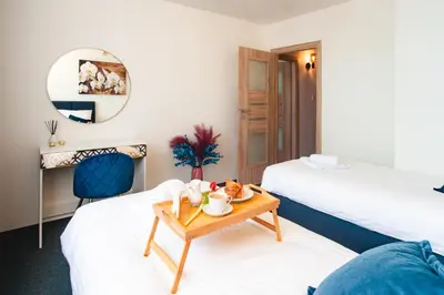 Łóżko lub łóżka w pokoju w obiekcie Apartament Panorama