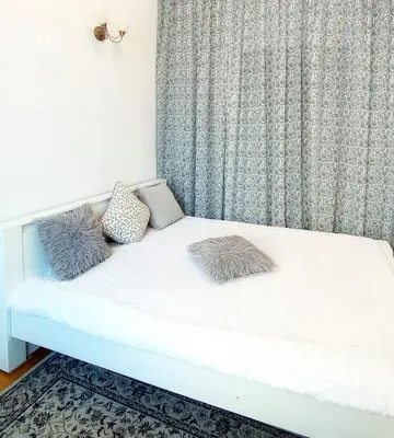Łóżko lub łóżka w pokoju w obiekcie Apartamenty dobowe w centrum Warszawy Lok 3