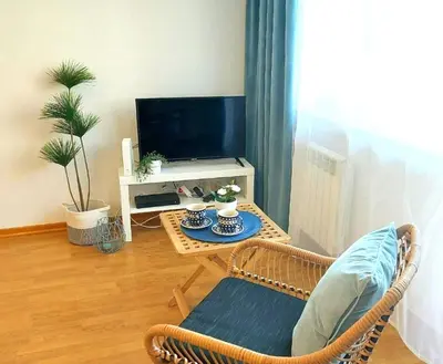 Telewizja i/lub zestaw kina domowego w obiekcie Rental Apartments Wałowa