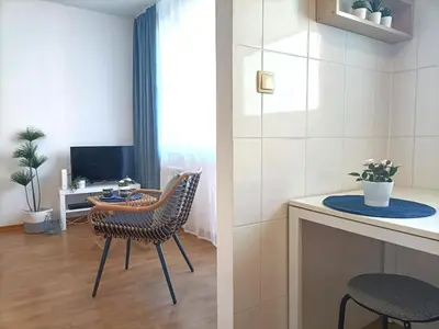 Telewizja i/lub zestaw kina domowego w obiekcie Rental Apartments Wałowa