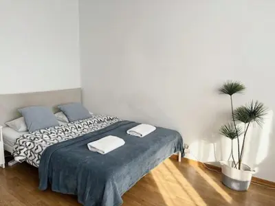 Łóżko lub łóżka w pokoju w obiekcie Rental Apartments Wałowa