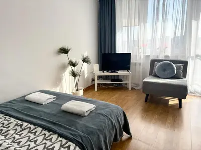 Łóżko lub łóżka w pokoju w obiekcie Rental Apartments Wałowa