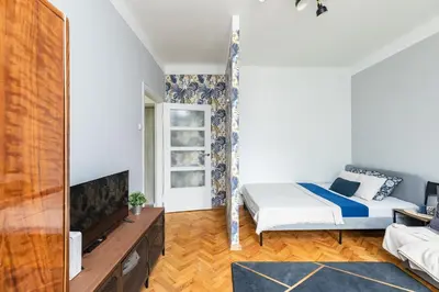 Łóżko lub łóżka w pokoju w obiekcie SuperApart Żelazna 29 - Blisko Złotych Tarasów