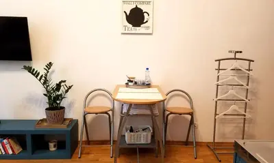 Telewizja i/lub zestaw kina domowego w obiekcie Apartamenty w centrum Warszawu Lok 4