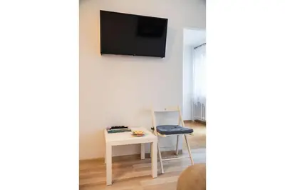 Telewizja i/lub zestaw kina domowego w obiekcie Solec Powiśle Apartment by BookingHost