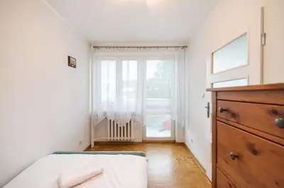 Łóżko lub łóżka w pokoju w obiekcie Solec Powiśle Apartment by BookingHost
