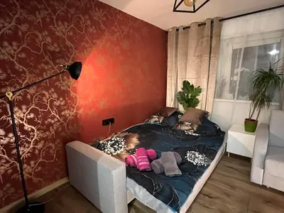 Łóżko lub łóżka w pokoju w obiekcie Kameralna kawalerka w stylu loftu blisko centrum