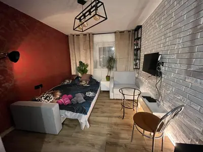 Część wypoczynkowa w obiekcie Kameralna kawalerka w stylu loftu blisko centrum
