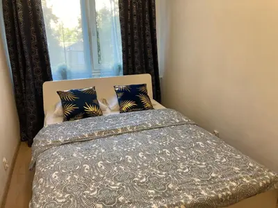 Łóżko lub łóżka w pokoju w obiekcie Apartament Puławska