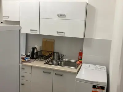 Kuchnia lub aneks kuchenny w obiekcie Apartament Puławska