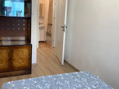 Łóżko lub łóżka w pokoju w obiekcie Apartament Puławska