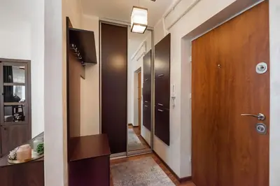 Telewizja i/lub zestaw kina domowego w obiekcie Ogrodowa Warm Wood Apartment by BookingHost