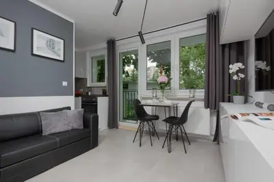 Część wypoczynkowa w obiekcie Metro Wierzbno Cozy Studio Mokotów by Noclegi Renters
