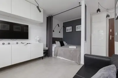Kuchnia lub aneks kuchenny w obiekcie Metro Wierzbno Cozy Studio Mokotów by Noclegi Renters