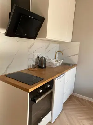 Kuchnia lub aneks kuchenny w obiekcie Grabowska 8 by Homeprime