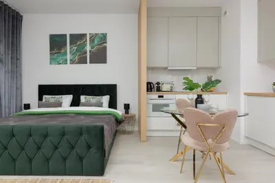 Łóżko lub łóżka w pokoju w obiekcie Cozy Studio Żupnicza Soho Factory by Noclegi Renters
