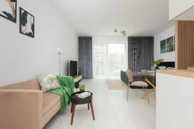 Część wypoczynkowa w obiekcie Cozy Studio Żupnicza Soho Factory by Noclegi Renters