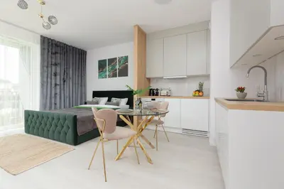 Kuchnia lub aneks kuchenny w obiekcie Cozy Studio Żupnicza Soho Factory by Noclegi Renters