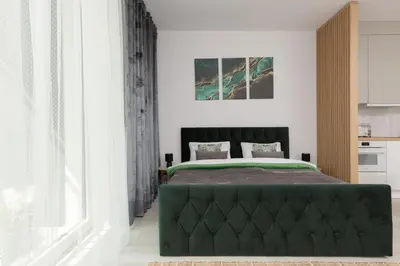 Łóżko lub łóżka w pokoju w obiekcie Cozy Studio Żupnicza Soho Factory by Noclegi Renters