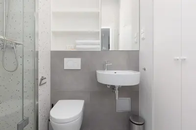 Łazienka w obiekcie Karolkowa Apartments Warsaw by Noclegi Renters