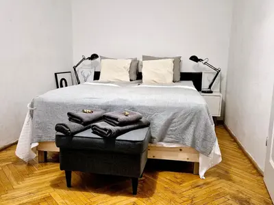 Łóżko lub łóżka w pokoju w obiekcie Apartament Miodowa Warszawa