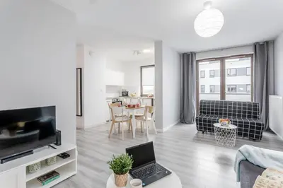 Telewizja i/lub zestaw kina domowego w obiekcie Chill Apartments Praga Południe