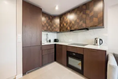 Kuchnia lub aneks kuchenny w obiekcie Powiśle Chic Apartment by BookingHost