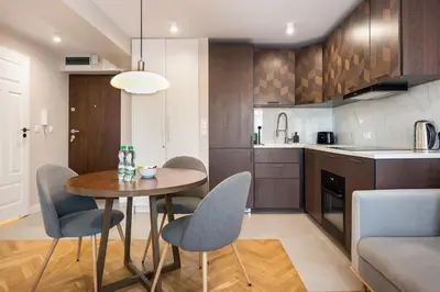 Kuchnia lub aneks kuchenny w obiekcie Powiśle Chic Apartment by BookingHost