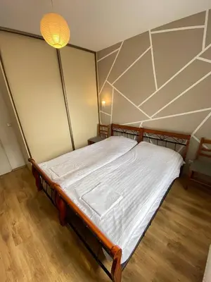 Łóżko lub łóżka w pokoju w obiekcie Murano Apartaments Nova Praga
