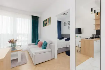Część wypoczynkowa w obiekcie Warsaw Kotsisa Apartments with Parking by Noclegi Renters