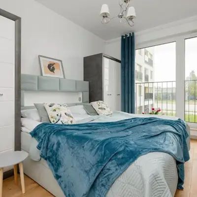 Warsaw Kotsisa Apartments with Parking by Noclegi Renters