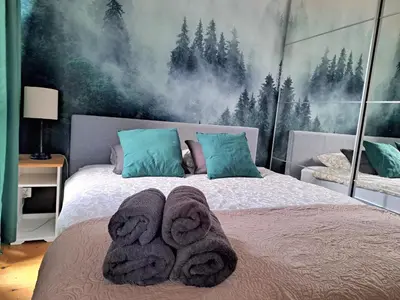 Łóżko lub łóżka w pokoju w obiekcie Chillout Apartment JK46 - Free parking, Fv Vat
