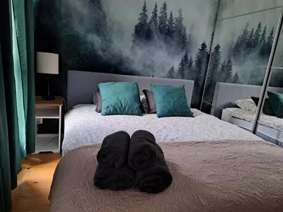 Łóżko lub łóżka w pokoju w obiekcie Chillout Apartment JK46 - Free parking, Fv Vat
