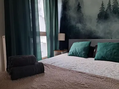Łóżko lub łóżka w pokoju w obiekcie Chillout Apartment JK46 - Free parking, Fv Vat
