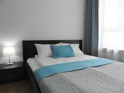 Łóżko lub łóżka w pokoju w obiekcie 2 Bedrooms, 7 Minutes from Airport