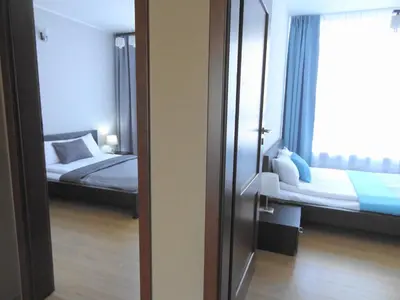 Łóżko lub łóżka w pokoju w obiekcie 2 Bedrooms, 7 Minutes from Airport