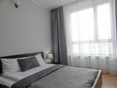 Łóżko lub łóżka w pokoju w obiekcie 2 Bedrooms, 7 Minutes from Airport