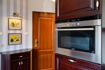 Kuchnia lub aneks kuchenny w obiekcie Metro Wilanowska Homely Apartment by BookingHost