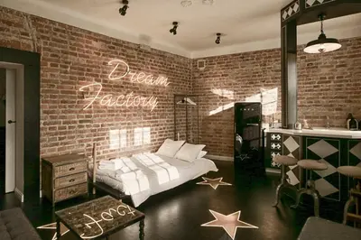 Łóżko lub łóżka w pokoju w obiekcie Dream Factory Apartment
