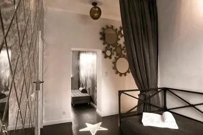 Łóżko lub łóżka w pokoju w obiekcie Dream Factory Apartment