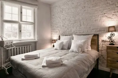 Łóżko lub łóżka w pokoju w obiekcie Dream Factory Apartment