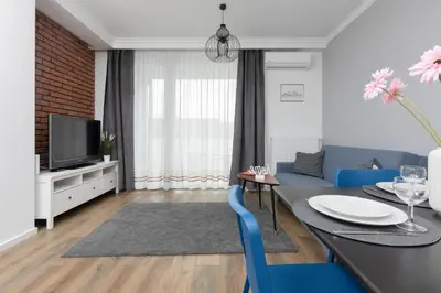 Telewizja i/lub zestaw kina domowego w obiekcie Warsaw Ursynów Apartment with Balcony by Noclegi Renters
