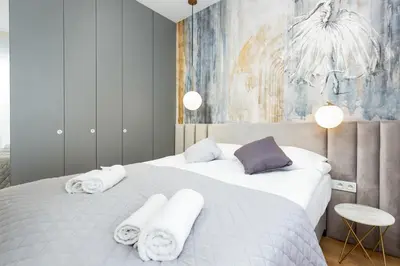 Łóżko lub łóżka w pokoju w obiekcie One Bedroom Apartment in Warsaw Center by Renters Prestige