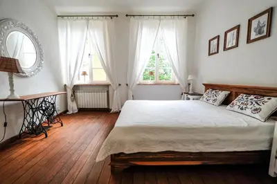 Łóżko lub łóżka w pokoju w obiekcie Castle Square Apartment
