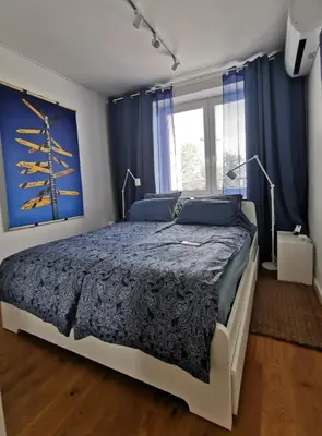 Łóżko lub łóżka w pokoju w obiekcie Studio Anielewicza