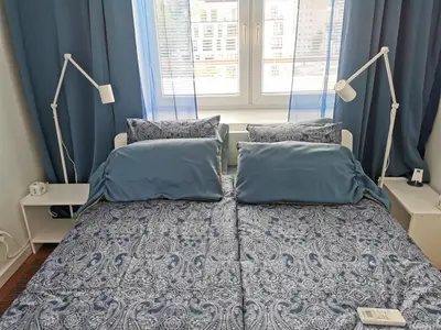 Łóżko lub łóżka w pokoju w obiekcie Studio Anielewicza