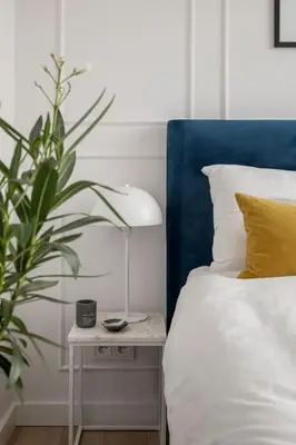Łóżko lub łóżka w pokoju w obiekcie Stylowy apartament przy metrze