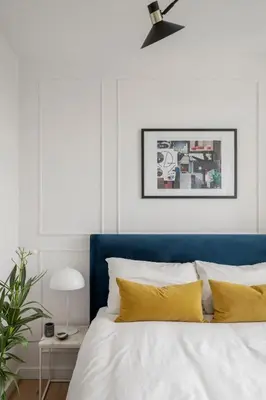Łóżko lub łóżka w pokoju w obiekcie Stylowy apartament przy metrze