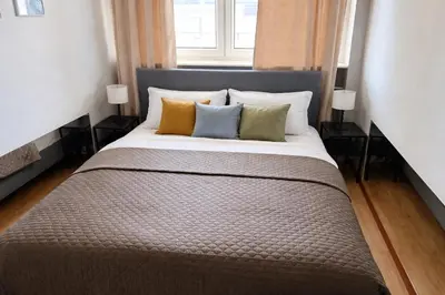 Łóżko lub łóżka w pokoju w obiekcie OhMyHome Złota Colors